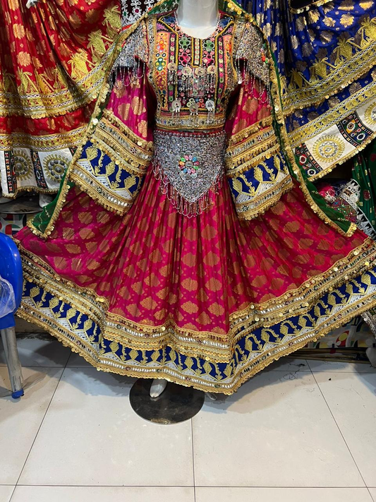 Afghan bridal dress in magenta brocade with navy gold border and mirror work bodice