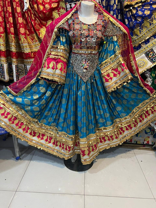 Afghan bridal dress in teal and gold with crimson dupatta on mannequin