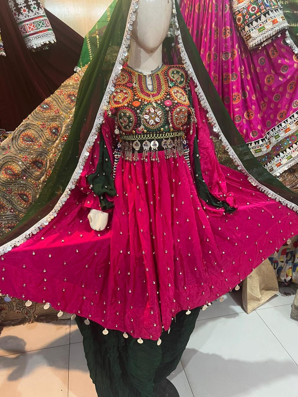 Afghan bridal dress in crimson red with dark green dupatta and mirror work embroidery